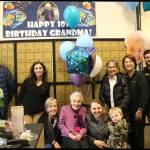 Eileen Wilkinson celebrates her 101st birthday at the Issaquah Highlands UPS store on Wednesday surrounded by friends and family. Nicole Jennings/staff photo