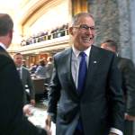 Gov. Jay Inslee leaves the House chamber following his annual state-of-the state address before a joint legislative session Tuesday in Olympia. (Elaine Thompson / Associated Press)