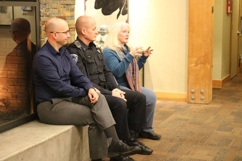 Robin Kelley, right, asks a question about budgeting during the Q+A period. Nicole Jennings/staff photo