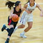 Photo courtesy of Patrick Krohn/Patrick Krohn Photography                                Eastlake Wolves senior guard Gina Marxen, right, puts pressure on Newport guard Nicole Chan, left, as she dribbled the ball upcourt in a matchup between KingCo 4A teams on Feb. 1.
