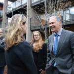 Gov. Inslee greets new Issaquah Mayor Mary Lou Pauly outside the zHome housing development, the first zero net energy townhouse development in the United States. Nicole Jennings/staff photo