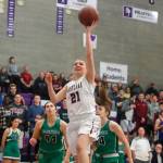 Photo courtesy of Don Borin/Stop Action Photography                                Eastlake Wolves senior Cameron Edward, who will play college basketball at Pomona College next season, drives to the hoop against the Woodinville Falcons in the Class 4A KingCo tournament championship game on Feb. 15. Woodinville defeated Eastlake 75-61.