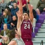 Photo courtesy of Patrick Krohn/Patrick Krohn Photography                                Skyline senior forward Evan Alexander, left, tries to block Eastlake junior Yousef Elkugia. Skyline earned a 55-54 win against the Eastlake Wolves in a loser-out, KingCo 4A playoff matchup on Feb. 15.
