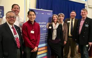 From left, Tom Leonidas, Adam Mihlstin with the Bellevue Breakfast Rotary Club; Mike Hatada and Cori Walters with the Issaquah Food & Clothing Bank; Pat Turner, Alex Hopkins, and President Kaj Pedersen with Bellevue Breakfast Rotary Club at the Feb. 16 club meeting. Photo courtesy of Bellevue Breakfast Rotary Club