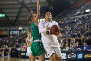 Photo courtesy of Don Borin/Stop Action Photography                                Eastlake Wolves sophomore Keeli Burton scored a team-high 30 points and had 21 rebounds against the Woodinville Falcons in the Class 4A state semifinals. Burton scored 14 points in the fourth quarter.
