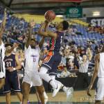 Photo courtesy of Don Borin/Stop Action Photography                                Eastside Catholic Crusaders guard Shane Nowell drives to the hoop against the Garfield Bulldogs in the Class 3A state semifinals on March 2 at the Tacoma Dome. Garfield earned a 56-48 victory against Eastside Catholic.
