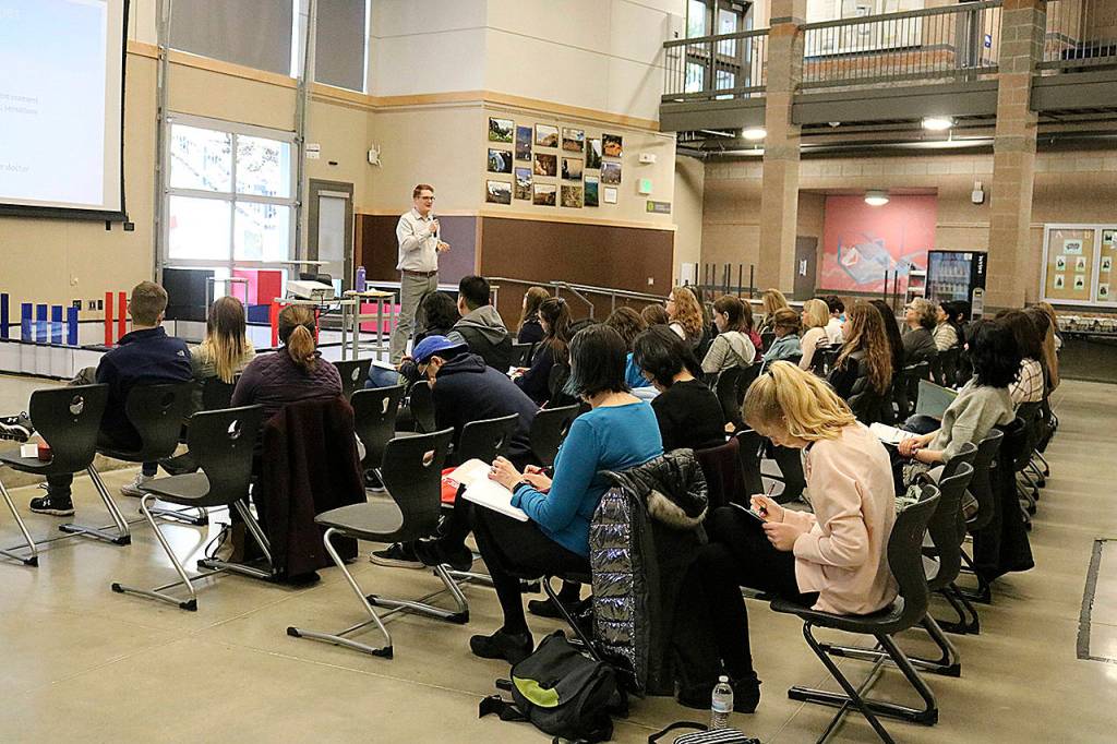 Josh Cutler, a behavioral health specialist at Swedish Medical Center, gives the keynote address at Saturdays State of Mind conference at Gibson Ek High School in Issaquah. Nicole Jennings/staff photo