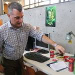 Issaquah Friends of Youth Director Jerry Blackburn shows how some alcohols are designed to look like energy drinks.