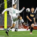 Photo courtesy of Rick Edelman/Rick Edelman Photography                                In battle between the top two KingCo 4A boys soccer squads, the Skyline Spartans attained a monumental triumph. Skyline registered a 1-0 win against the Issaquah Eagles on April 6. The Spartans improved their overall record to 6-0-2 with the victory while Issaquah dropped to 7-1. Skyline defender Sam Jarvis (pictured) controls the ball against Issaquah during the matchup between rivals.