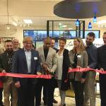 Guest celebrity Seahawk Doug Baldwin cuts ribbon of new Issaquah La-Z-Boy