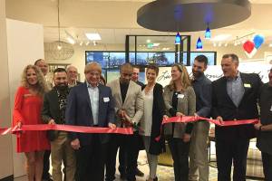Guest celebrity Seahawk Doug Baldwin cuts ribbon of new Issaquah La-Z-Boy