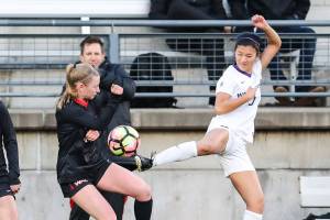 Photo courtesy of Rick Edelman/Rick Edelman Photography                                Issaquah High School 2017 graduate Kaylene Pang (pictured on right), who will be a sophomore defender on the University of Washington Huskies womens soccer team when it opens up regular season action this fall, competes against Seattle University in a spring game on April 12 in Seattle. Pang made 10 appearances off of the bench during her freshman season in 2017.