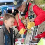 A young boy learns about the work done by Friends of the Issaquah Salmon Hatchery. Courtesy Photo