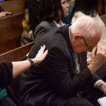 Mike Shunn reacts as Snohomish County chief criminal deputy prosecutor Craig Matheson makes opening statements in the trial of John Blaine Reed, accused of murdering Monique Patenaude and Patrick Shunn, at the Snohomish County Courthouse on Thursday in Everett. (Andy Bronson / The Herald)