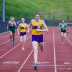 Photo courtesy of Don Borin/Stop Action Photography                                 Issaquah Eagles senior Elise Burdette, center, registered a first place finish in the 400 with a time of 56.95 at the Class 4A District II track championships on May 18 at the Southwest Athletic Complex in Seattle.