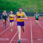 Photo courtesy of Don Borin/Stop Action Photography                                Issaquah Eagles senior Elise Burdette, center, registered a first place finish in the 400 with a time of 56.95 at the Class 4A District II track championships on May 18 at the Southwest Athletic Complex in Seattle.