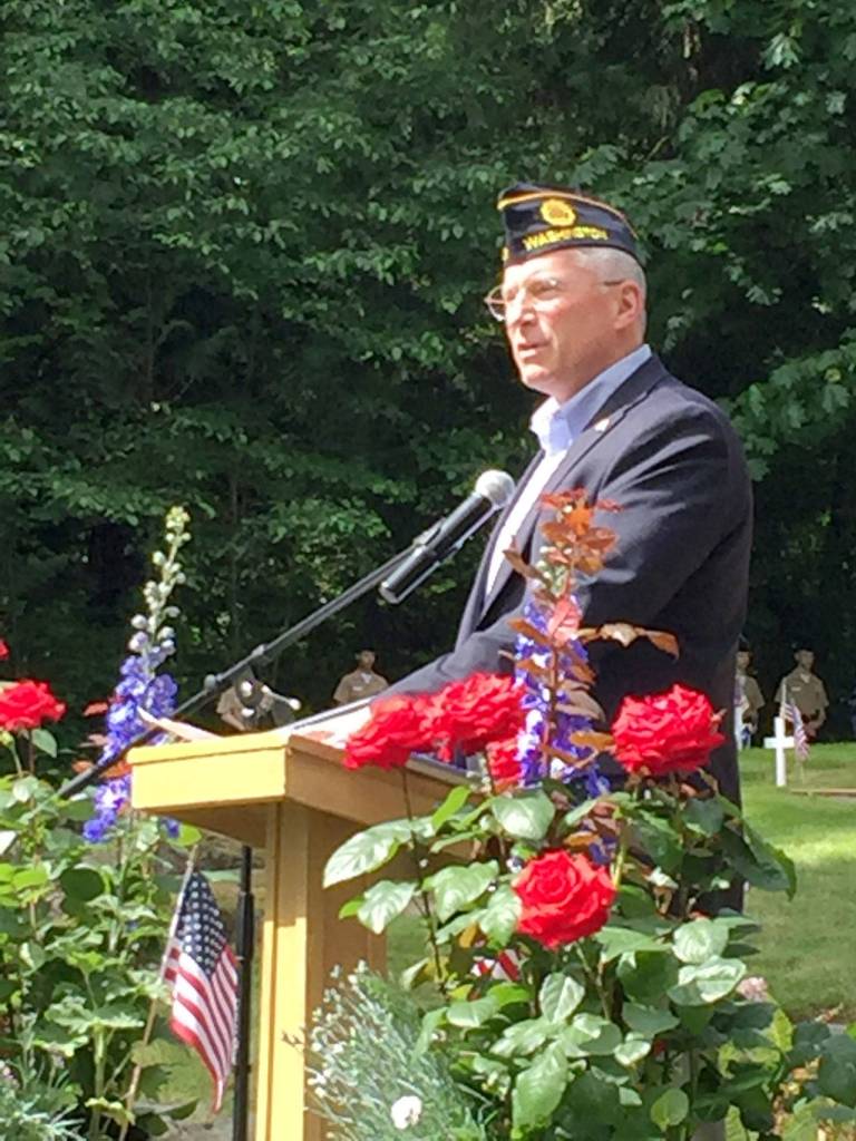Navy Veteran and former 5th District Representative Chad Magendanz gives a reading and personal reflection. William Shaw/Staff Photo