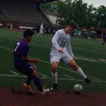 Shaun Scott, staff photo                                Skyline Spartans midfielder Dennis Bilginer, right, tries to maneuver around Pasco midfielder Kevin Meraz Rodriguez, left, in the first half of the Class 4A state soccer championship game on May 26 at Sparks Stadium in Puyallup. Pasco defeated Skyline 1-0 in overtime.