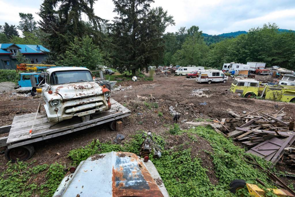 The 10 acre plot known as Iron Mountain is home to countless broken-down cars, boats, fire trucks, buses, and even a street sweeper. The sprawling junkyard encircles Pillons home. Photo by Caean Couto