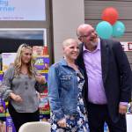 Erin Hansman and Mike Eberhard pose for a picture, post head-shaving. Eberhard is the president of SAP Concur and Hansman is a senior analyst of customer experience at SAP Concur. Photo courtesy of Eastside Baby Corner