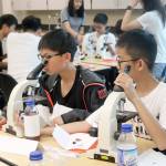 Exchange students participate in forensic investigation class as part of the enrichment camps at Eastside Catholic School. Evan Pappas/staff photo