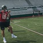 Skyline senior quarterback Joe Green, who will play college football at Harvard next season, takes a deep drop before throwing a screen pass during practice on Aug. 16 in Sammamish. Shaun Scott/staff photo