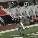 Eastside Catholic Crusaders wide receiver Gee Scott Jr. hauls in a deep pass from assistant coach Greg Prator on the second day of practice. Shaun Scott/staff photo