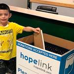 Evergreen Academy students donatee 294 school supplies to benefit local children