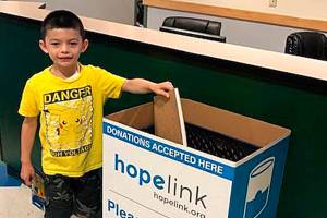 Evergreen Academy students donatee 294 school supplies to benefit local children