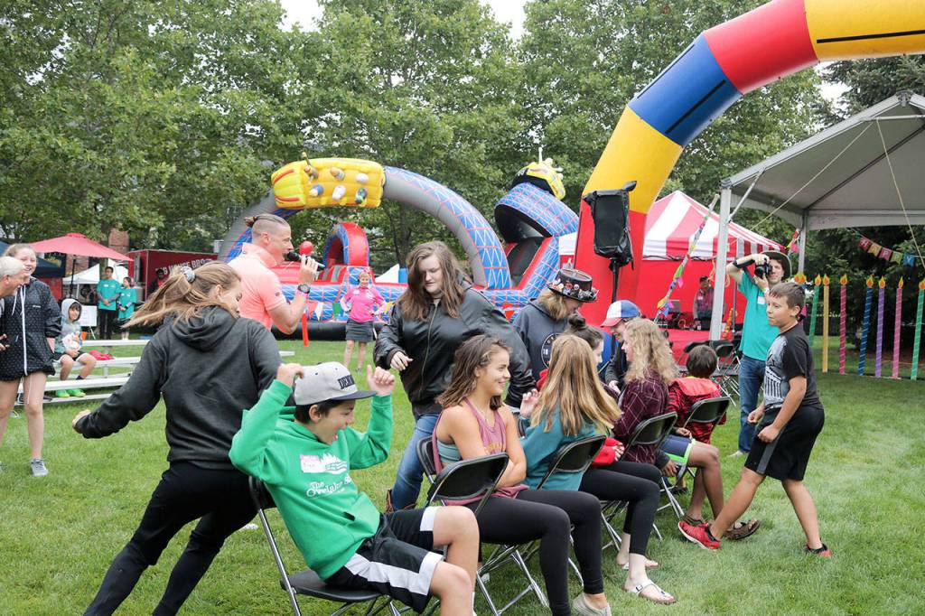 Middle and High School students compete in a game of musical chairs. Evan Pappas/Staff Photo