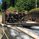 The dump truck was engulfed in flames when first responders arrived on the scene. Photos courtesy of Washington State Patrol Trooper Rick Johnson