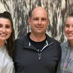 The Eastlake Wolves volleyball team is led by senior outside hitter Lauren Martin, left, and junior outside hitter Anna Ilstrup, right. Former Eastlake assistant coach Mike Knapick (center) is in his first season leading the Wolves varsity program. Shaun Scott/staff photo