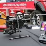 The drone sits on a table along side the camera operators controls, showcasing the thermal imaging camera view. Evan Pappas/Staff Photo