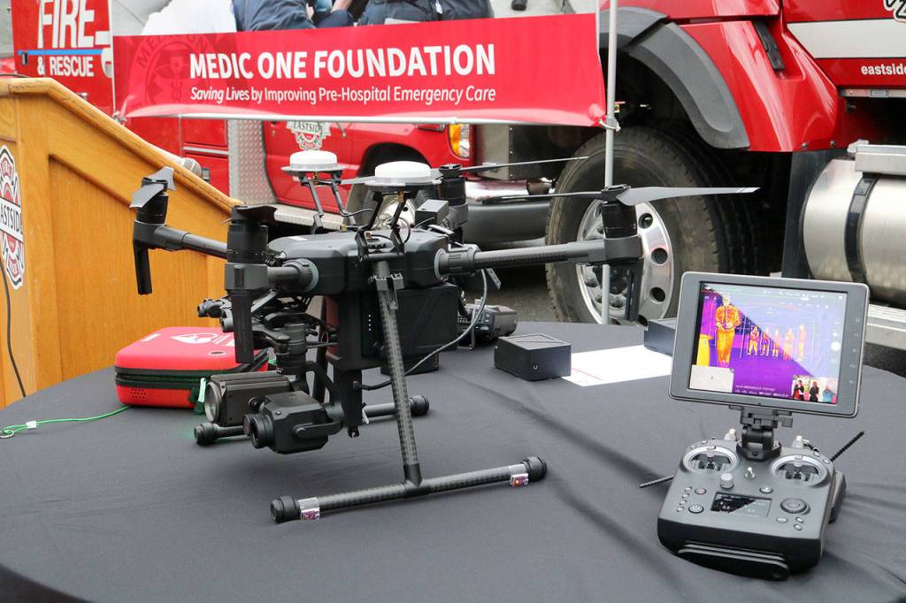 The drone sits on a table along side the camera operators controls, showcasing the thermal imaging camera view. Evan Pappas/Staff Photo