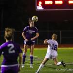 Issaquah Eagles senior defender Kate Wilkinson connects on a header in a game earlier this season. Wilkinson has led the Eagles to a 5-0-1 record in early season action. Photo courtesy of Don Borin/Stop Action Photography