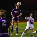 Issaquah Eagles senior defender Kate Wilkinson connects on a header in a game earlier this season. Wilkinson has led the Eagles to a 5-0-1 record in early season action. Photo courtesy of Don Borin/Stop Action Photography