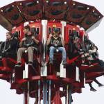 Thrill seekers are raised up a carnival ride during Issaquahs Salmon Days. The carnival was located at Issaquah Elementary School, down the road from the main festival. Aaron Kunkler/staff photo