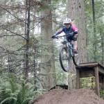 Sweetlines rider Molly Pop smoothly leaps from a large jump on the Voodoo Child trail. Evan Pappas/Staff Photo