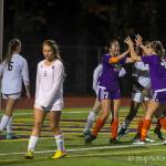 Issaquah players celebrate after Sarah Kim (No. 7) scored a goal in the 36th minute of play. Issaquah defeated Lake Stevens 3-0 in the first round of the Wes-King 4A soccer playoffs on Oct. 30 at Gary Moore Stadium in Issaquah. Photo courtesy of Don Borin/Stop Action Photography