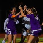 Issaquah players celebrate after Sarah Kim (No. 7) scored a goal in the 36th minute of play. Issaquah defeated Lake Stevens 3-0 in the first round of the Wes-King 4A soccer playoffs on Oct. 30 at Gary Moore Stadium in Issaquah. Photo courtesy of Don Borin/Stop Action Photography