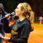 Issaquah Eagles 2018 graduate Claudia Longo addresses the crowd during halftime of the Issaquah Eagles/Lake Stevens Vikings playoff game. Photo courtesy of Don Borin/Stop Action Photography