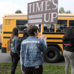 Skyline High School students and community protest perpetuation of rape culture following ISD lawsuit. Hadassah Klinger, a former ISD student, wears a jacket that says Hang on, it gets easier and then it gets okay and then it feels like freedom. Madison Miller/staff photo.