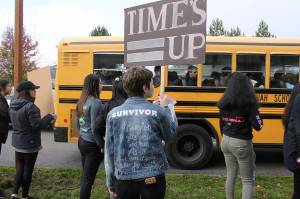 Skyline High School students and community protest perpetuation of rape culture following ISD lawsuit. Hadassah Klinger, a former ISD student, wears a jacket that says Hang on, it gets easier and then it gets okay and then it feels like freedom. Madison Miller/staff photo.