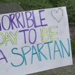 Skyline High School students and community protest perpetuation of rape culture following ISD lawsuit. Students designed signs to be seen throughout the demonstration. This sign says, Horrible day to be a Spartan. Madison Miller/staff photo.