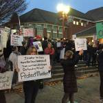 Residents display signs in support of U.S. Special Counsel Robert Mueller and in opposition of President Donald Trump during a rally in Issaquah on Nov. 8. William Shaw/Staff photo