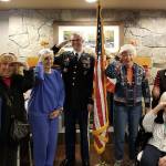 Sgt. 1st Class Trevor Riesner, an active service member, visits with Spiritwood residents during Veterans Day to answer questions and meet with other veterans. Photo courtesy of Jennifer Angell