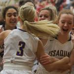 Issaquah Eagles players celebrate after Issaquah freshman Camryn Gibson (No. 3) recorded a game-winning basket at the buzzer against the Mount Si Wildcats. Issaquah defeated Mount Si,49-48, on Jan. 5. Photo courtesy of Don Borin/Stop Action Photography