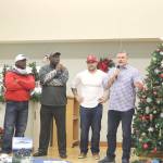 L-R: Randall Morris, Alonzo Mitz, Lofa Taupu, and Dave Wyman share their favorite football memories with the seniors of Issaquah Senior Center. Stephanie Quiroz/staff photo.