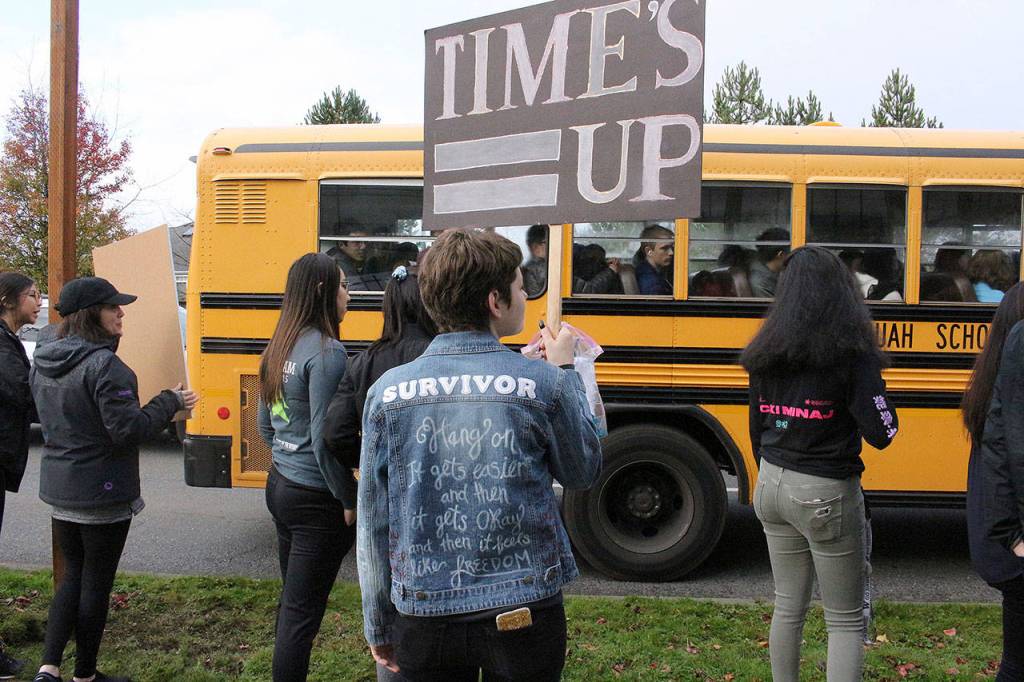 Skyline High School students and community protest perpetuation of rape culture following ISD lawsuit. Hadassah Klinger, a former ISD student, wears a jacket that says Hang on, it gets easier and then it gets okay and then it feels like freedom. Madison Miller/staff photo.