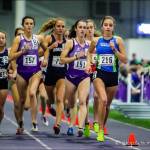 Issaquah Eagles sophomore Julia David-Smith (pictured furthest on the right) clocked a time of 5:04. 16 in the one-mile run at the University of Washington indoor track meet on Jan. 12 in Seattle. David-Smith earned first place in the Section 4 heat of the race. David-Smith finished ahead of collegiate athletes from the University of Portland, Gonzaga University, Seattle Pacific University, Western Oregon University, Simon Fraser University and Trinity Western in the race. Photo courtesy of Don Borin/Stop Action Photography